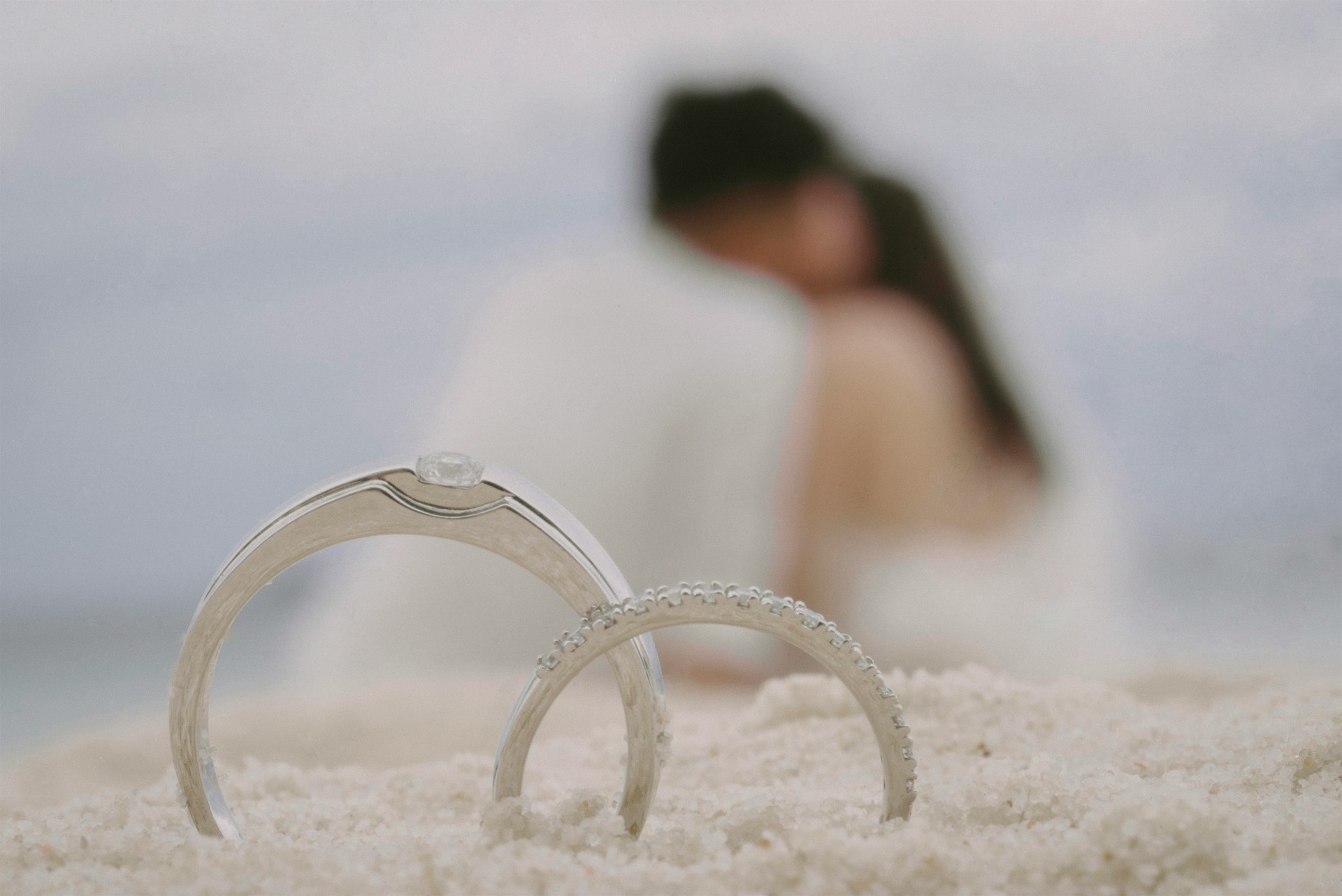 white heart shaped frame on white sand